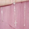 PEARL CROSS NECKLACE.SAINTLIORA