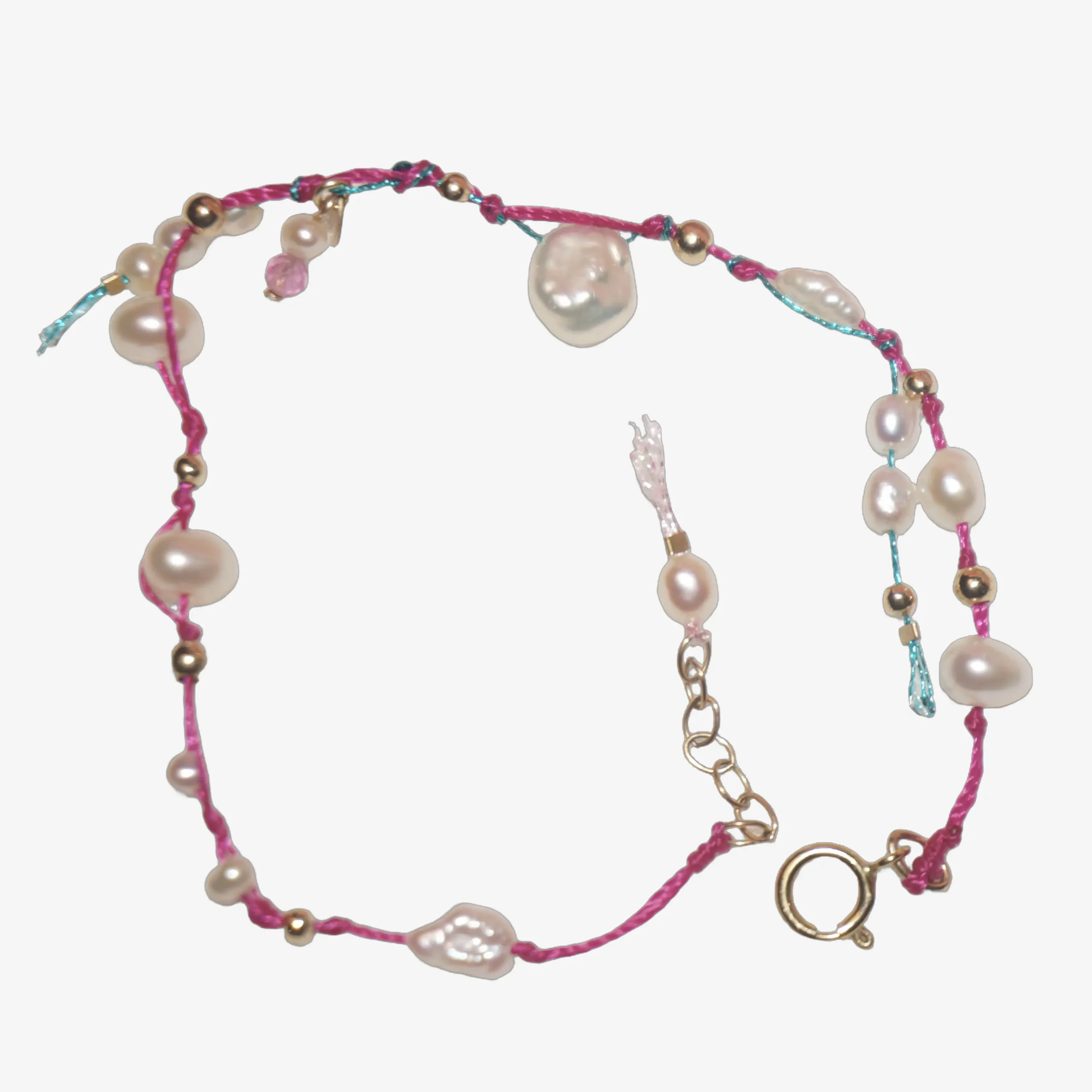 DAYDREAM UNDERTOW – 14KGF Cord Beaded Pearl Bracelet UNDERTOW pink and blue beaded pearl bracelet with shimmering threads, petal pearls and pink tourmaline